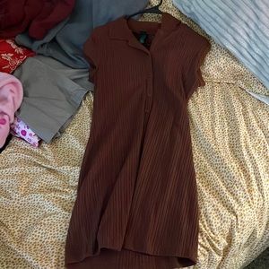 Dark red , tight , dress . Great for a dinner at home with the family .